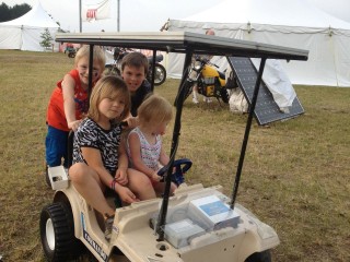 Kids on the Solar PowerWheels Jeep.